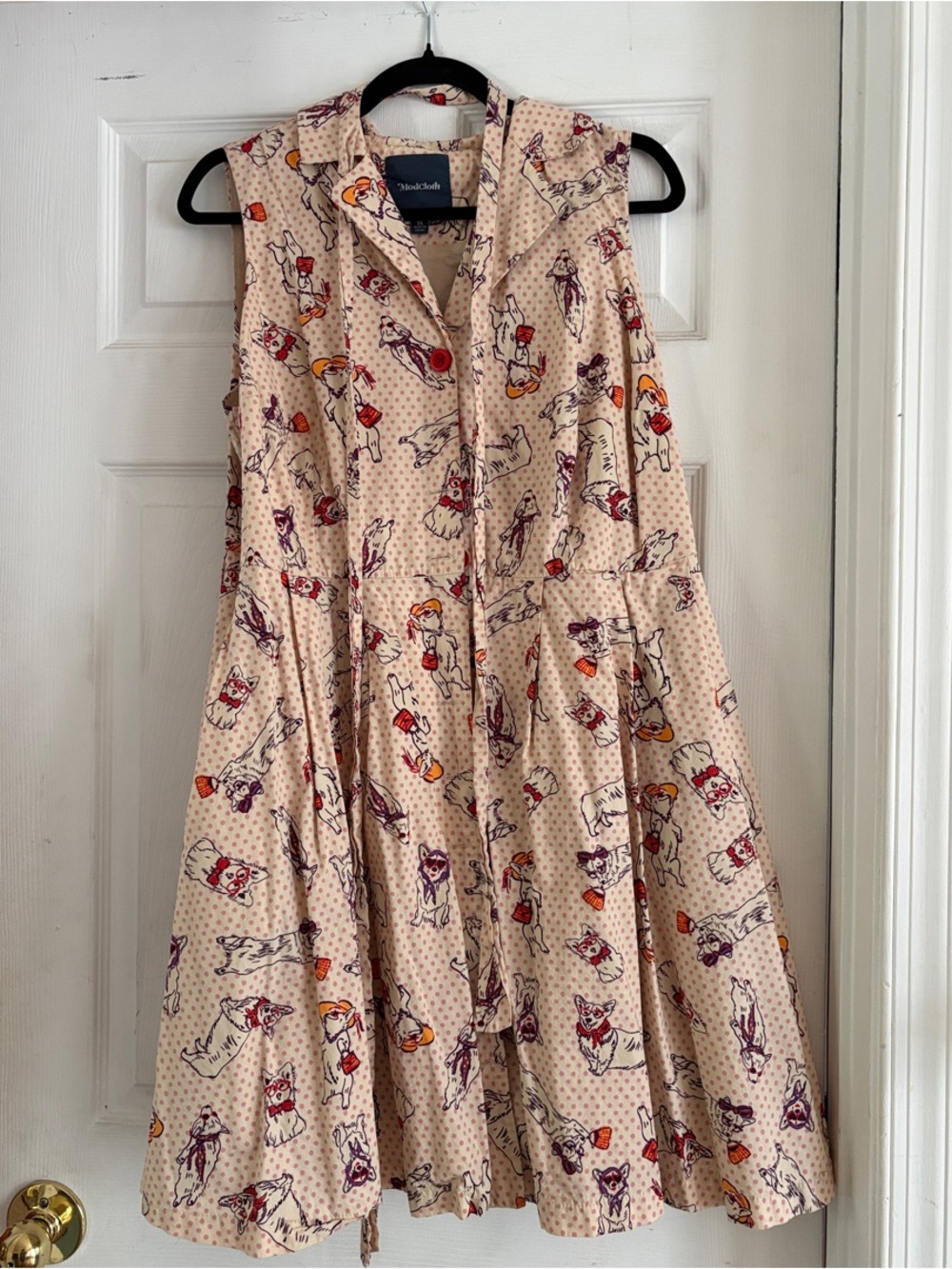 Sleeveless Cream Printed Swing Dress
